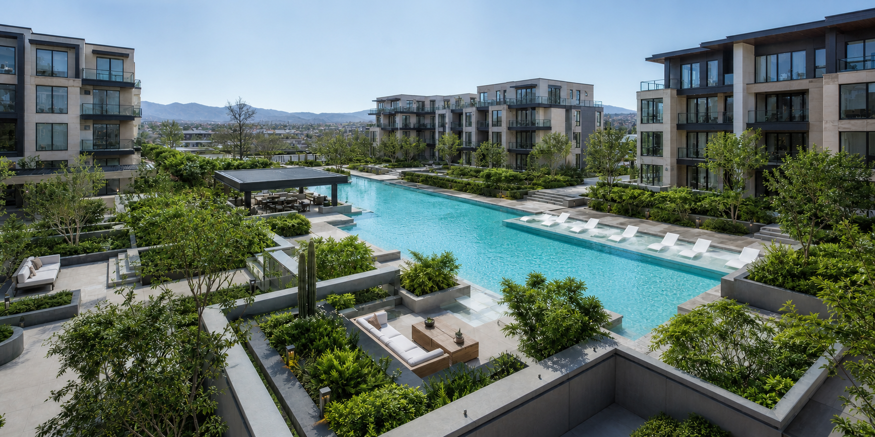 Edificios modernos de arquitectura contemporánea rodean una zona de amenidades premium con piscina de diseño elegante, camastros, áreas verdes.