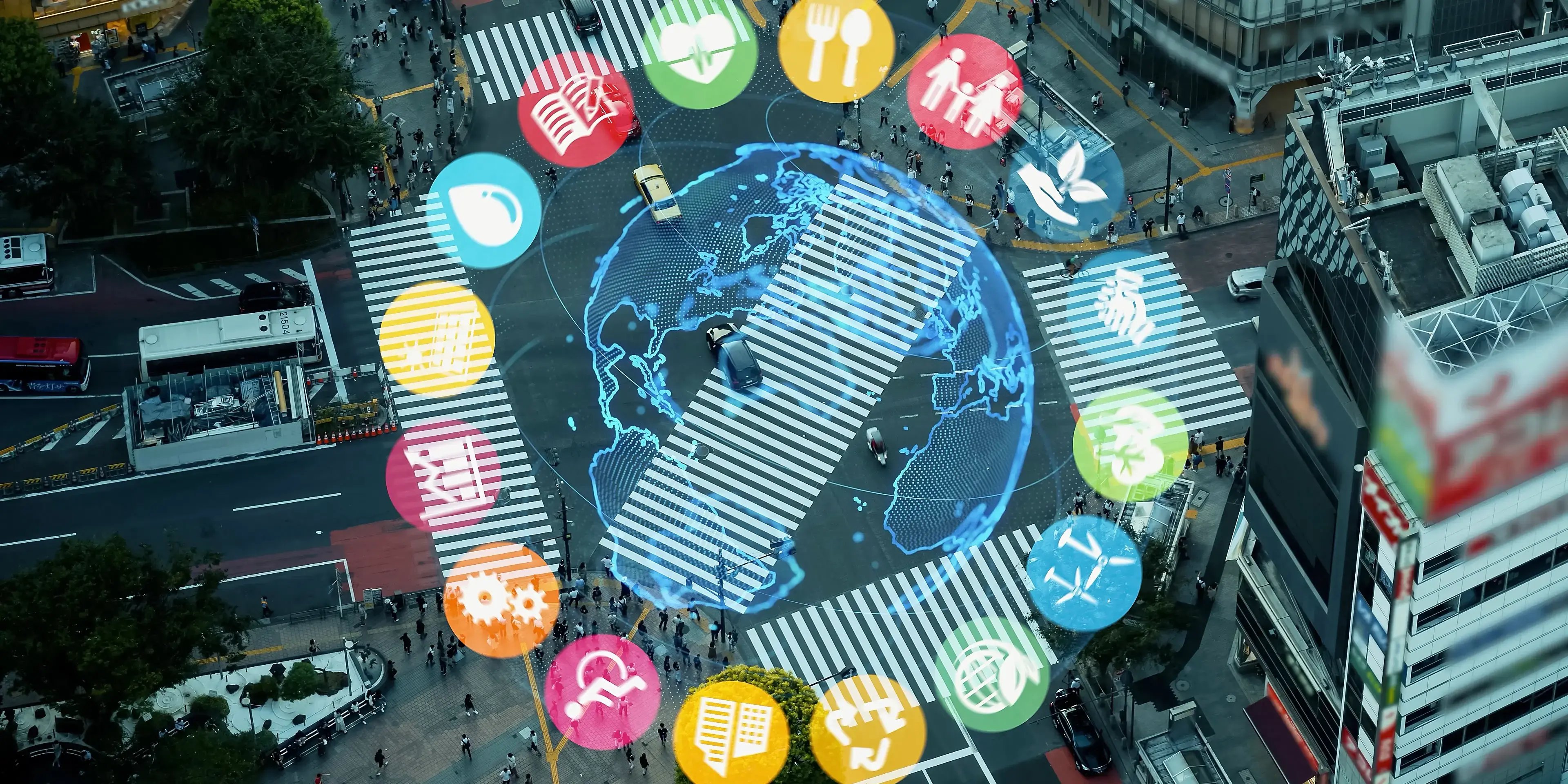 Vista aérea de una ciudad con íconos de desarrollo urbano y factores que aumentan las plusvalía como ubicación, infraestuctura y servicios