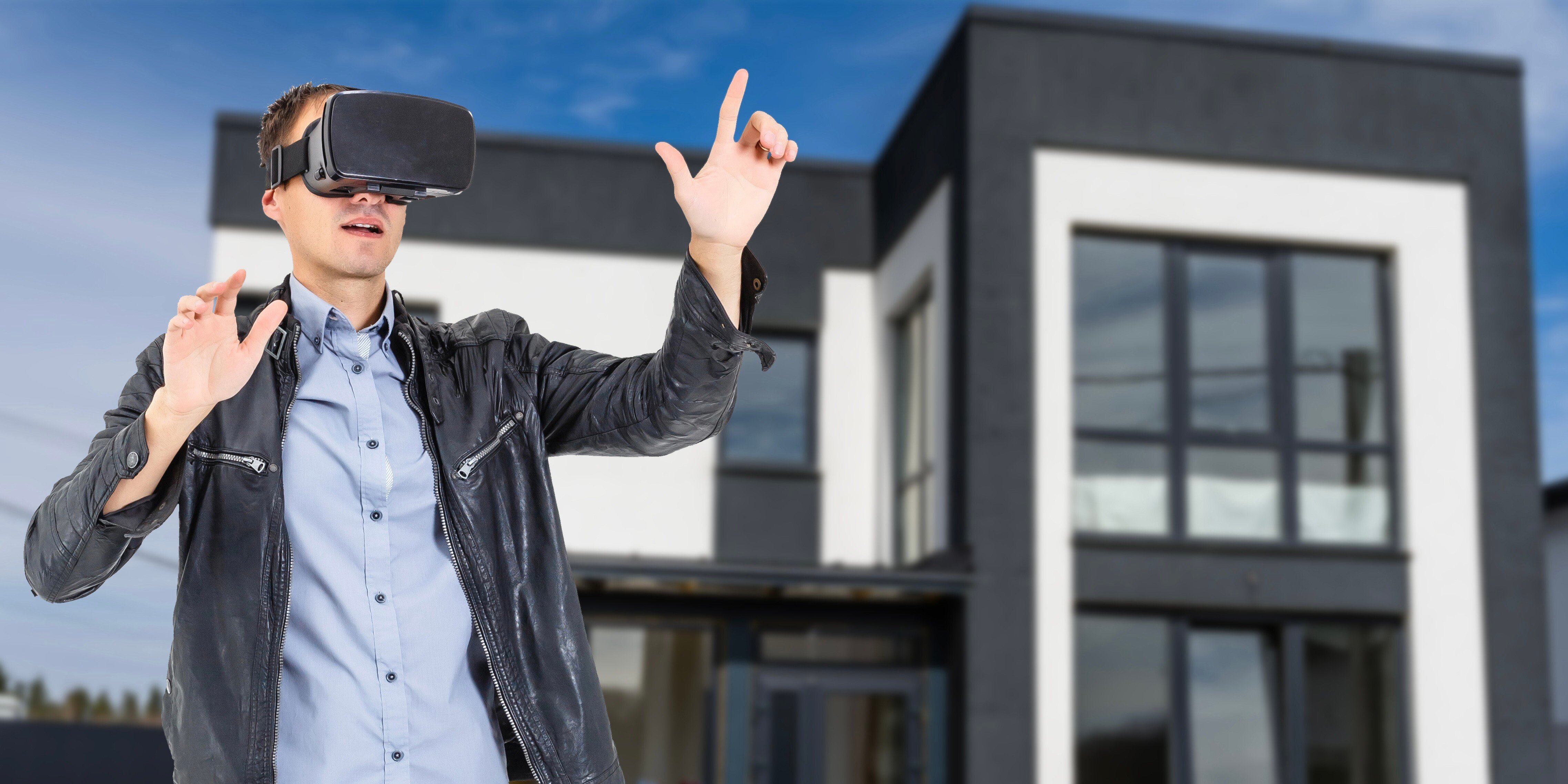 Hombre con lentes de realidad virtual. Mercado inmobiliario 2025